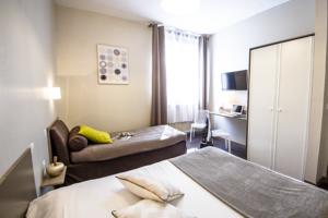 Hotel De La Pommeraie : photos des chambres