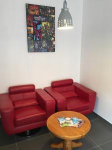 Appartement Studio centre ville avec parking : photos des chambres