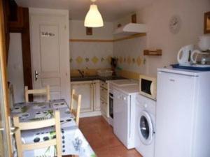 Hebergement House Au refuge du criquet : photos des chambres