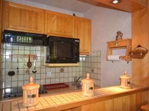 Appartement Apartment Alpina b : photos des chambres