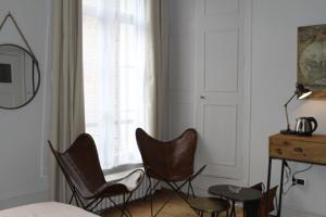 Chambres d'hotes/B&B Une Maison En Ville Chambre d'hotes : photos des chambres