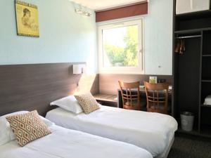 Hotel Les Orchidees Logis : Chambre Lits Jumeaux