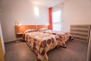 Appartement Les Pavillons du Rooy : photos des chambres