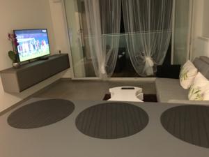 Appartement Les berges : photos des chambres