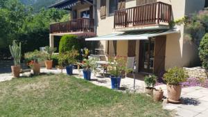 Hebergement Au Paradis des Grillons : photos des chambres
