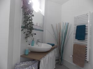 Appartement Le Jardin : photos des chambres