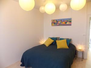 Appartement Le Jardin : photos des chambres