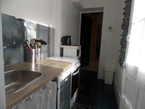Appartement Le Jardin : photos des chambres