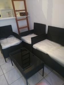 Appartement proche paris stade de france : photos des chambres