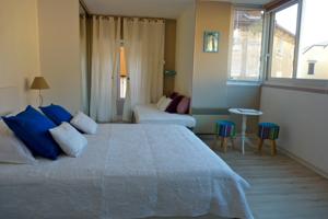 Appartements Centre Ville - Parking : photos des chambres