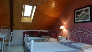 Chambres d'hotes/B&B Chambres d'hotes La Maison du Graal : photos des chambres