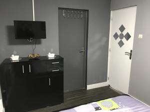 Appartement Maison cosy : photos des chambres