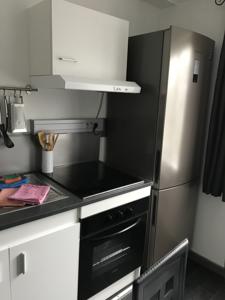 Appartement Maison cosy : photos des chambres