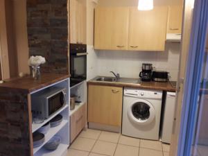 Appartement Les Jardins catalans : photos des chambres