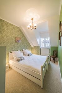 Appartement Les Demoiselles a Versailles - La Maison Particuliere : photos des chambres