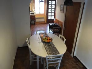 Hebergement Entre l'eglise et la place : photos des chambres