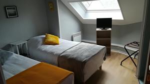 Hotel O PTi' NID : Chambre Lits Jumeaux