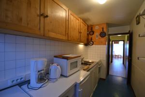 Appartement Les Mousquetaires : photos des chambres