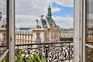 Appartement Hotel de ville : photos des chambres