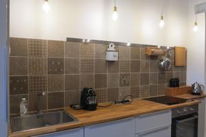 Appartement Petite Bourgade : photos des chambres
