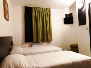 Hotel Welcomotel : Chambre Lits Jumeaux