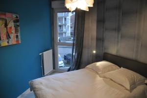 Appartement La ville au calme in the city : photos des chambres