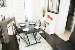 Appartement A 5 minutes de Paris : photos des chambres