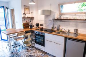 Appartement La Cuve a Vin & Le Grenier : photos des chambres