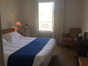 Nouvel Hotel du Commerce : photos des chambres