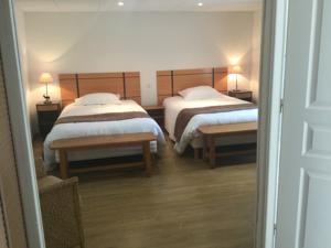 Nouvel Hotel du Commerce : photos des chambres