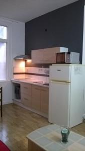 Appartement T2 Bouchon de Champagne : photos des chambres