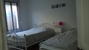 Appartement T2 Bouchon de Champagne : photos des chambres