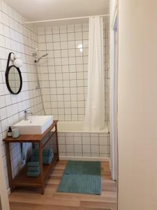 Appartement Aux pieds des thermes : photos des chambres