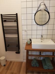 Appartement Aux pieds des thermes : photos des chambres