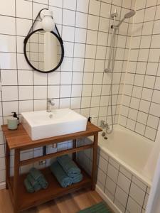 Appartement Aux pieds des thermes : photos des chambres