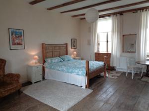 Hebergement The Mad Hatters Kitchen : Chambre Familiale - Vue sur Lac