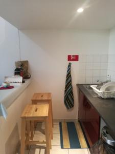 Appartement proche paris stade de france : photos des chambres
