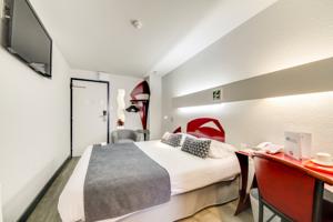 Brit Hotel Porte d’Espagne*** : photos des chambres