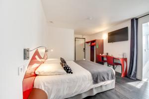 Brit Hotel Porte d’Espagne*** : photos des chambres