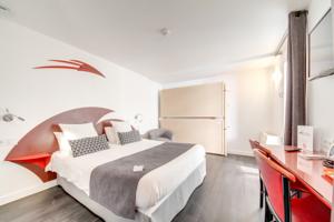 Brit Hotel Porte d’Espagne*** : photos des chambres