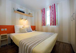 Hebergement Mobil Home dans Parc des 7 Fonts : photos des chambres
