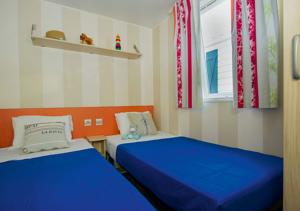 Hebergement Mobil Home dans Parc des 7 Fonts : photos des chambres