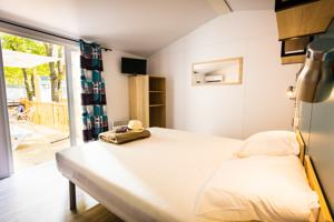 Hebergement Camping Le Bois Fleuri : photos des chambres