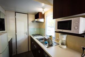 Hebergement Camping Le Bois Fleuri : photos des chambres