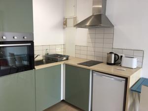 Appartement Les Mimosas Apartments : photos des chambres
