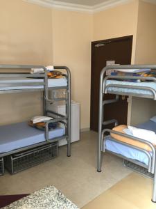 Auberge de jeunesse Antares hostel : Lit dans un Dortoir Mixte de 6 Lits