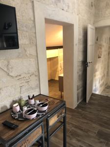 Appartement MAISON 2 APPTS et 1 CHAMBRE - CONCIERGERIE DE L'UZEGE : photos des chambres