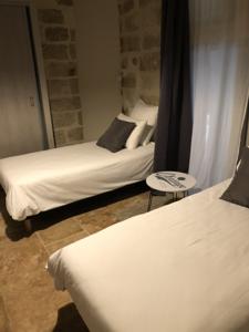 Appartement MAISON 2 APPTS et 1 CHAMBRE - CONCIERGERIE DE L'UZEGE : photos des chambres