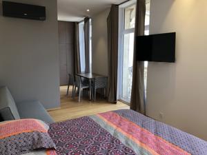 Appartement Le plein centre : photos des chambres