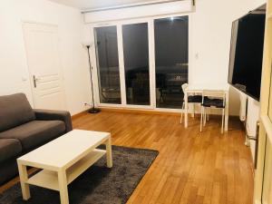 Appartement Tour Eiffel Croix Nivert : photos des chambres